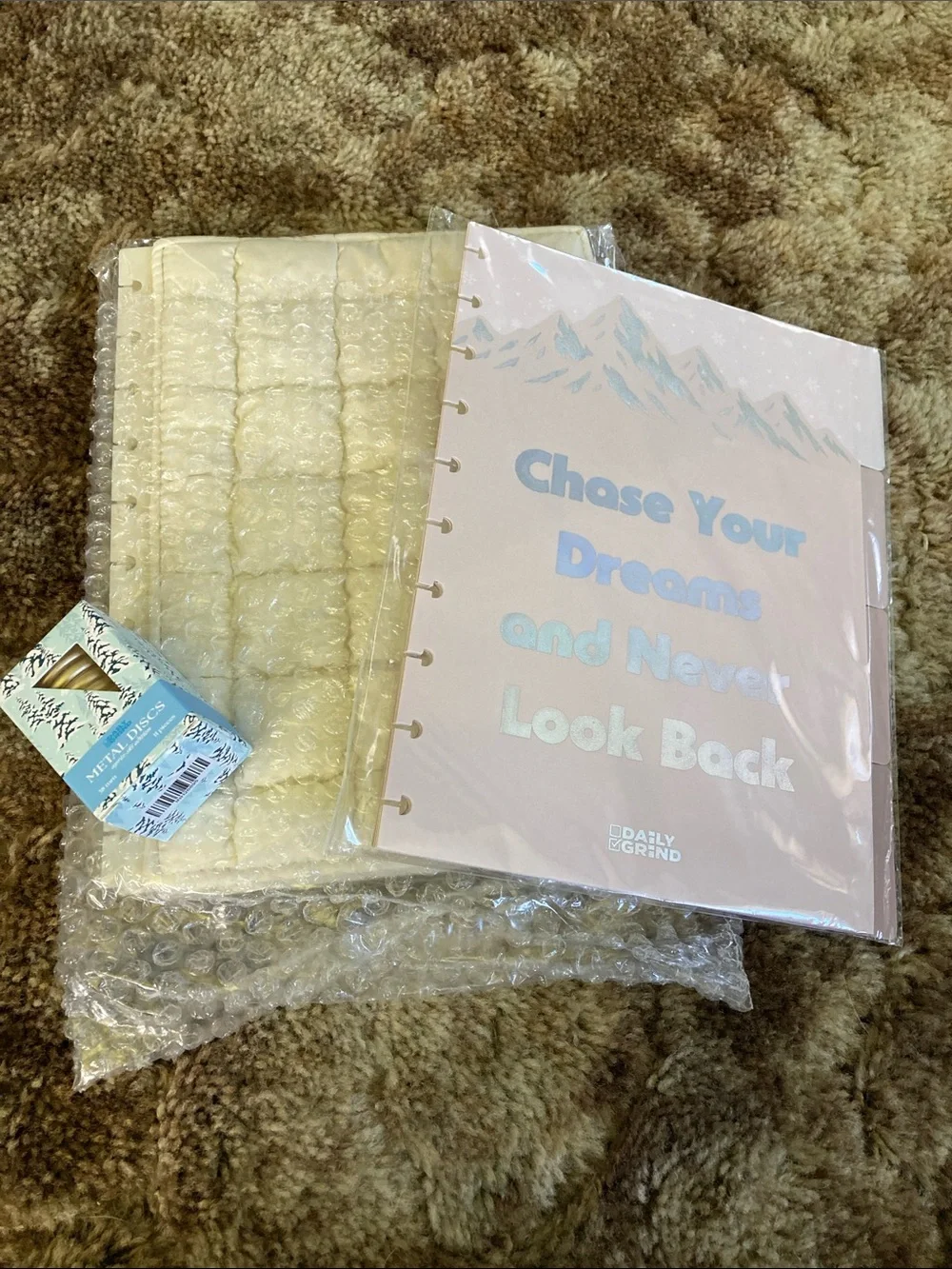 Daily Grind Apres-Ski quilted planner cover, metal disks, and dividers